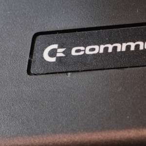 C64c case, small dent under Commodore label
